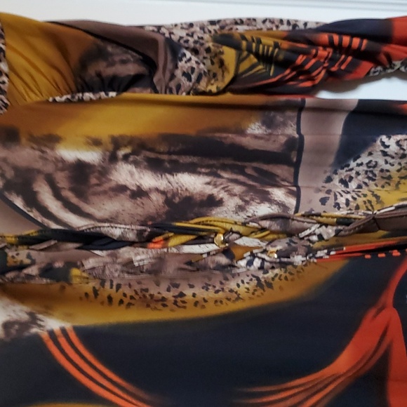 Maxime Paris made dress. Multi colored with attractive sleeves and hem. - Picture 6 of 8